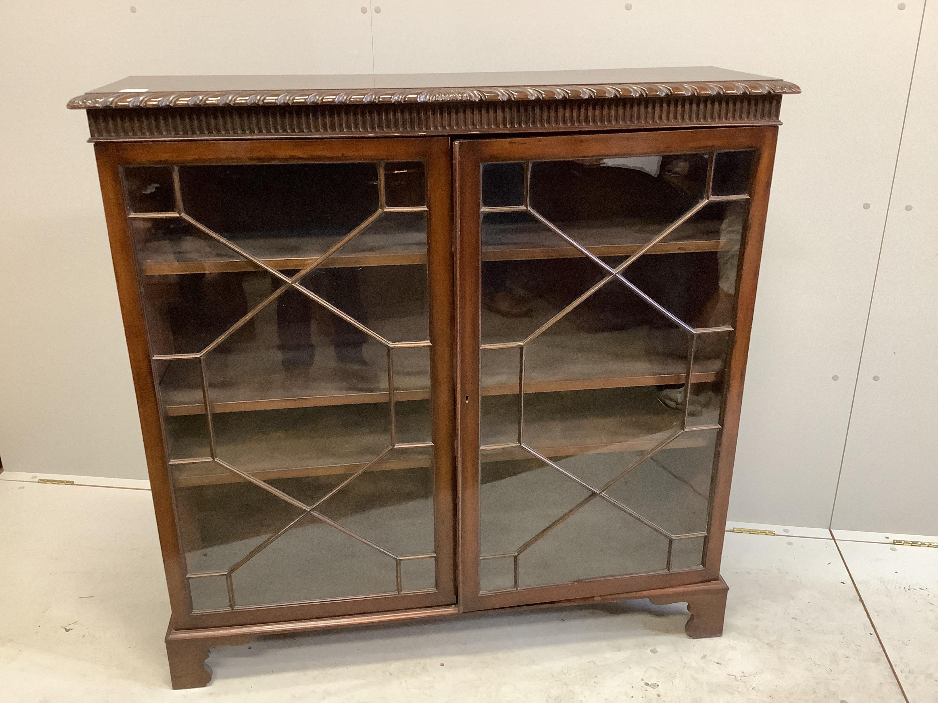 A Chippendale Revival mahogany dwarf bookcase, width 121cm, depth 34cm, height 121cm